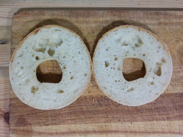 A bagel cut in halves