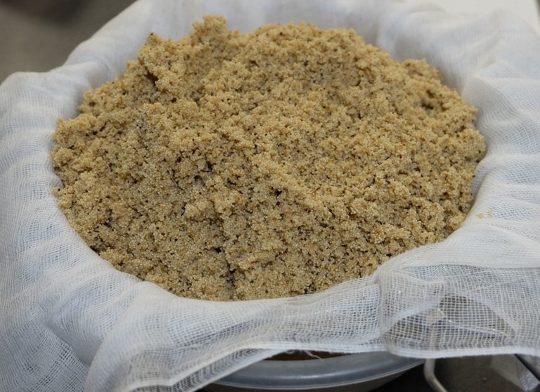 Removing water from cooked poppy